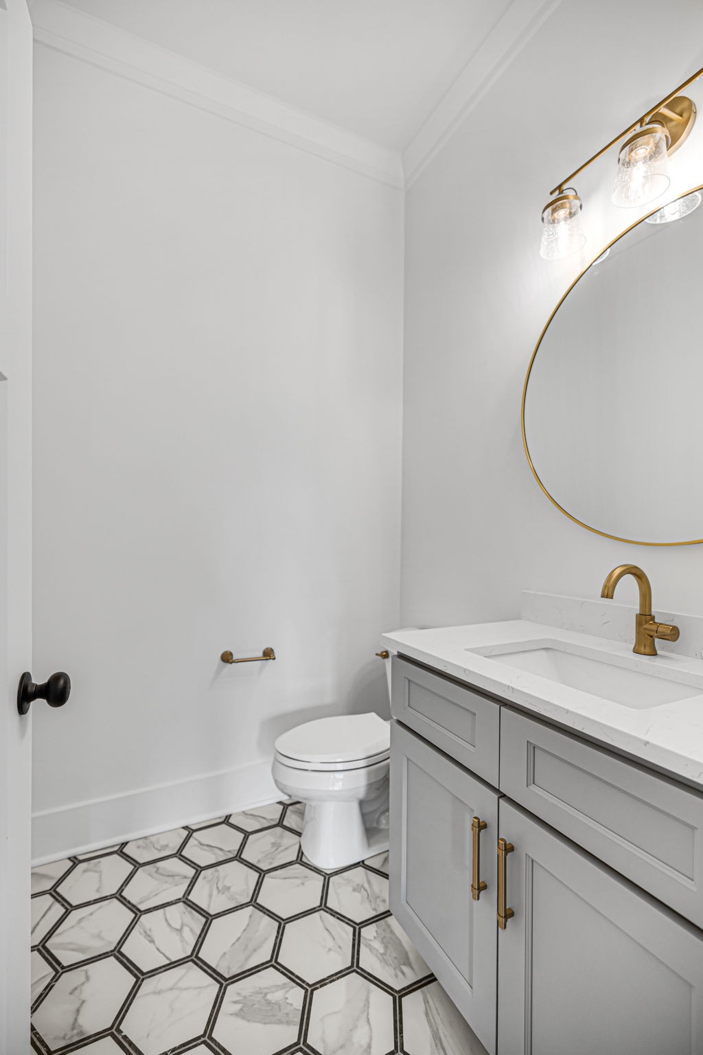 5925 Hunt Valley Drive Spring Hill, TN 37174 - Photo 46 of 69 a bathroom with a granite countertop sink mirror vanity and toilet
