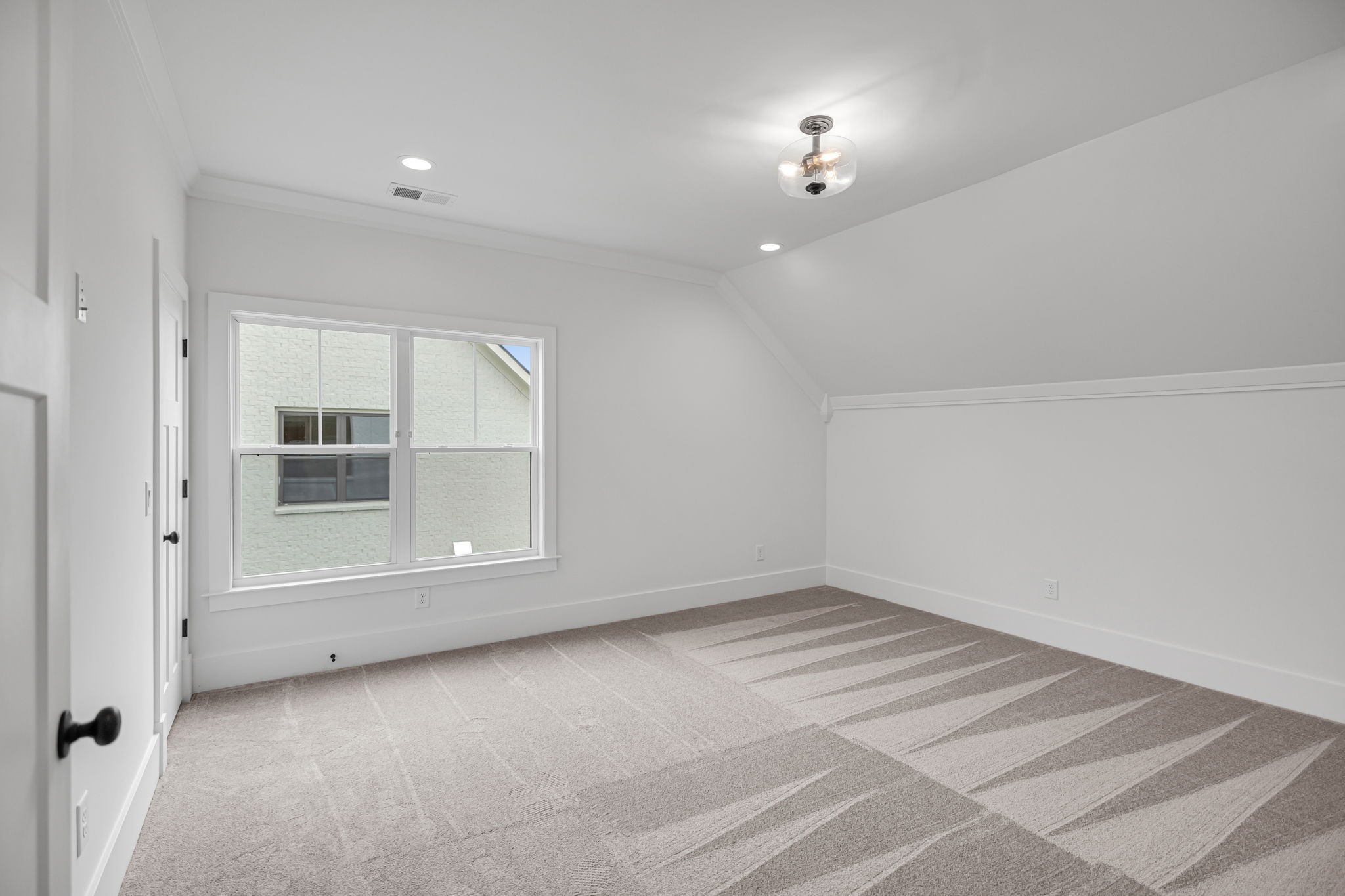 5925 Hunt Valley Drive Spring Hill, TN 37174 - Photo 49 of 69 an empty room with cabinet and windows