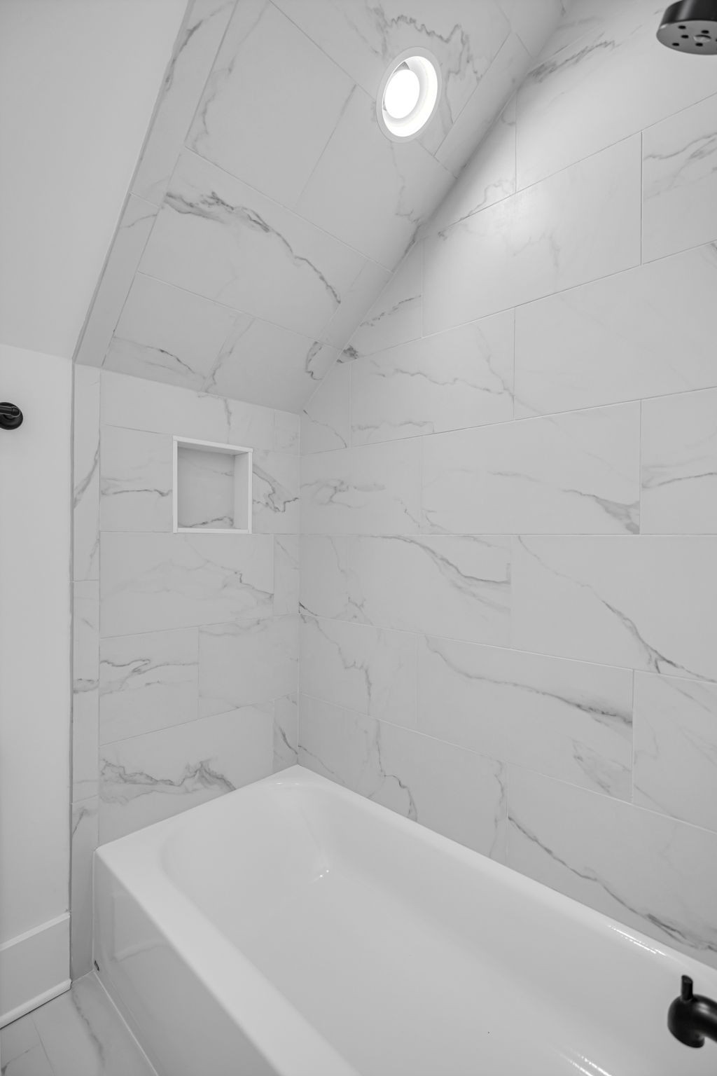 5925 Hunt Valley Drive Spring Hill, TN 37174 - Photo 52 of 69 a bathroom with a bathtub