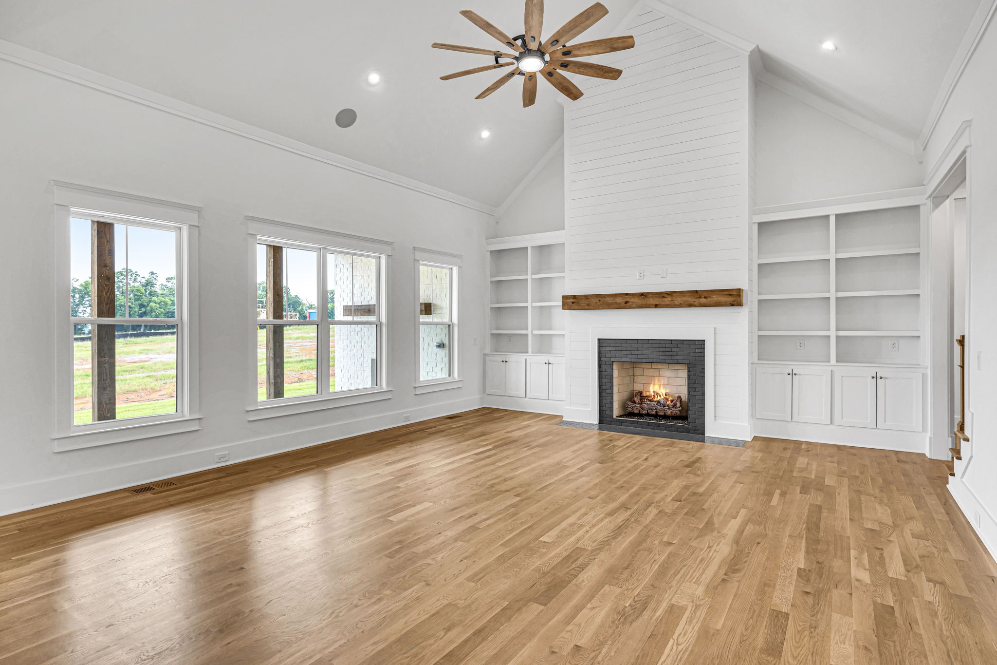 5925 Hunt Valley Drive Spring Hill, TN 37174 - Photo 6 of 69 a view of an empty room with a window and fireplace