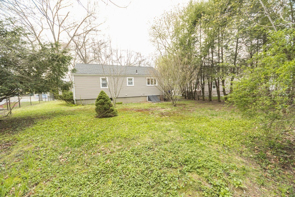 85 Russ Street Randolph, MA 02368 - Photo 13 of 16 a house view with a garden space
