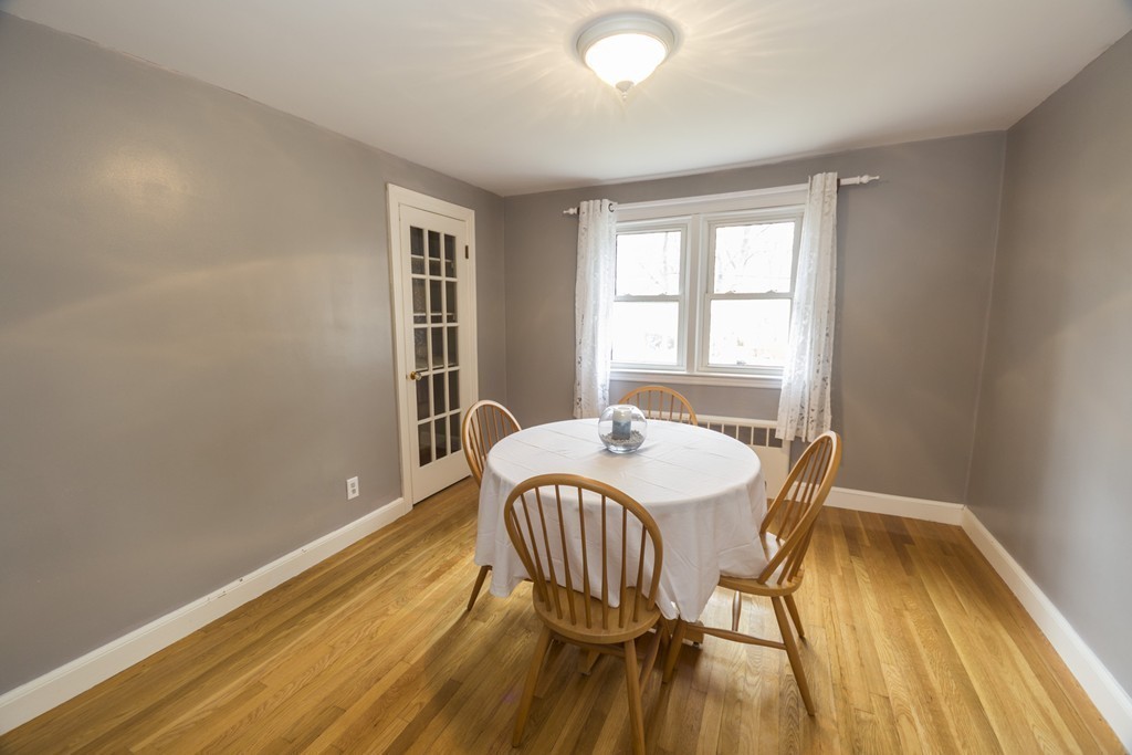 85 Russ Street Randolph, MA 02368 - Photo 8 of 16 a view of a dining room with furniture window and wooden floor