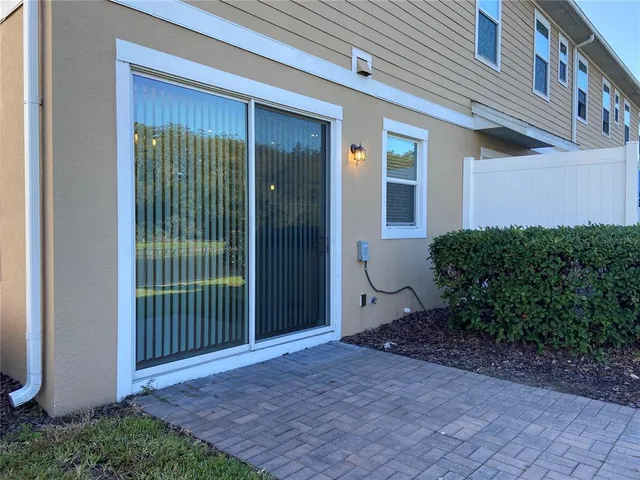 a view of a backyard of a house