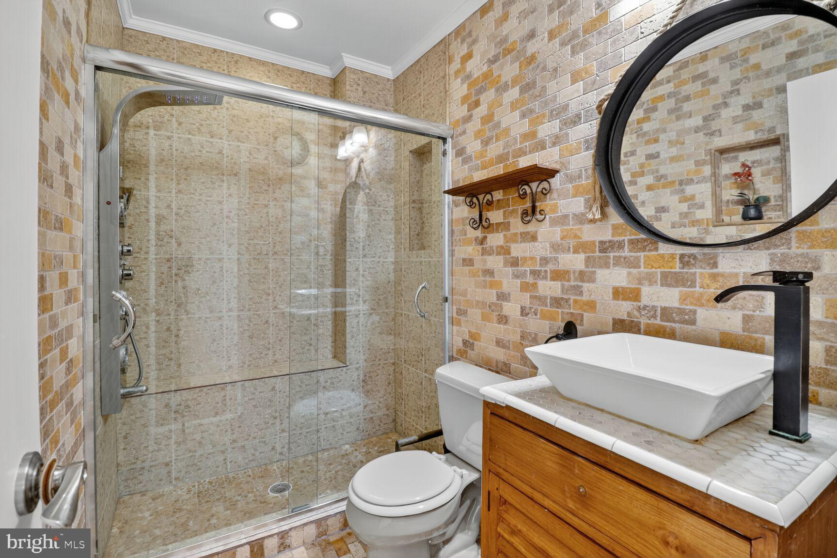 23 Penny Lane, Unit 23 Baltimore, MD 21209 - Photo 29 of 53 Custom tiled primary bath