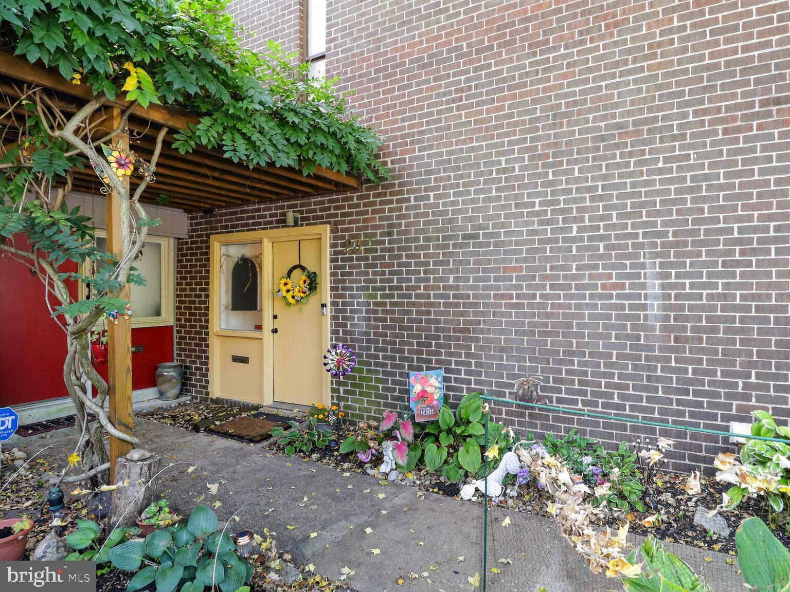 23 Penny Lane, Unit 23 Baltimore, MD 21209 - Photo 46 of 53 A garden path