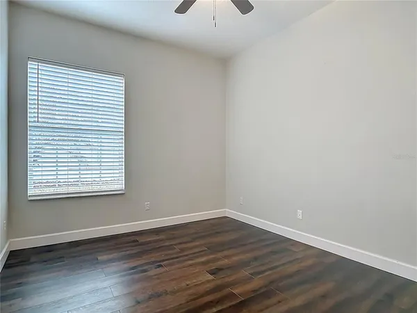 a bathroom with 2 sink and a mirror