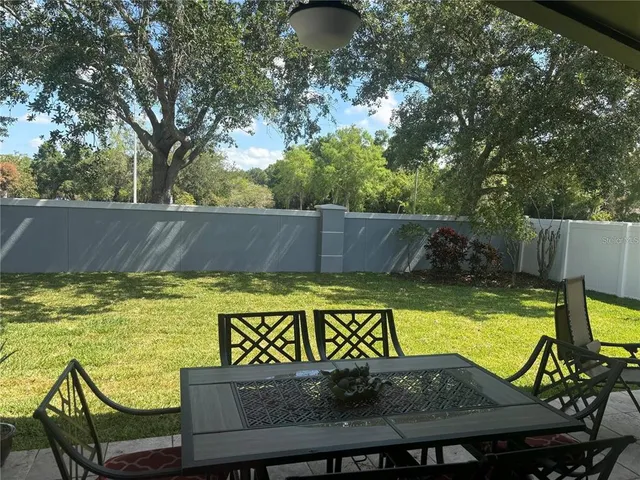 a view of swimming pool with a patio