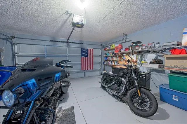 a bedroom with furniture and a gym equipment