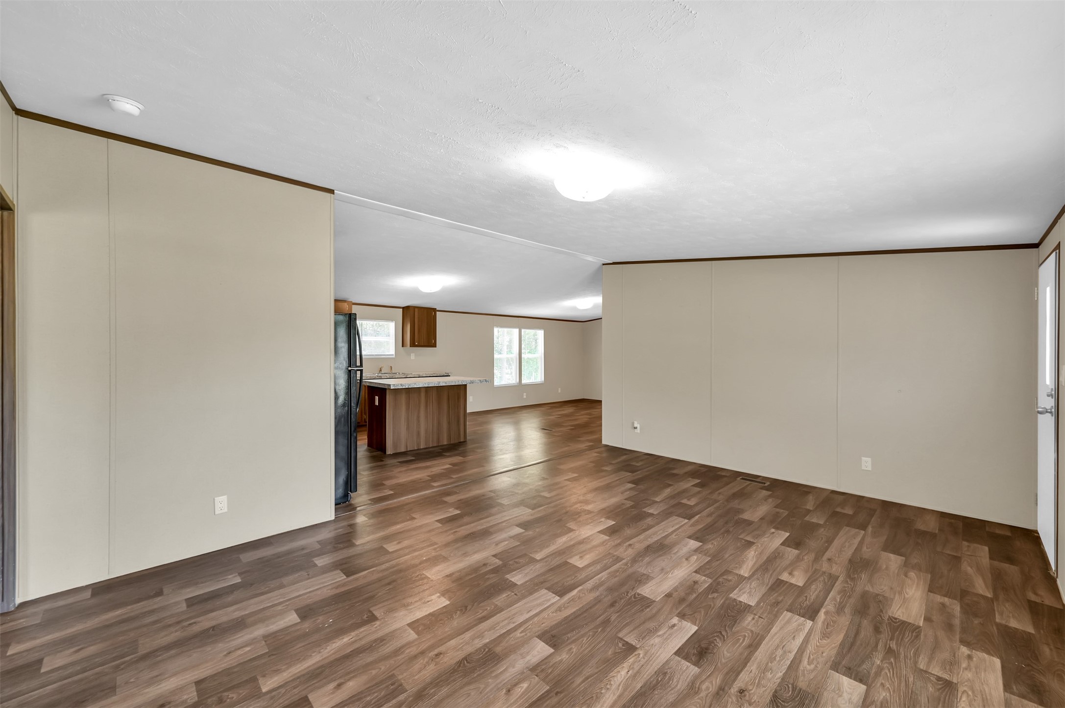 26768 A Dobbin-Huffsmith Road Magnolia, TX 77354 - Photo 11 of 29 wooden floor in an empty room with a window