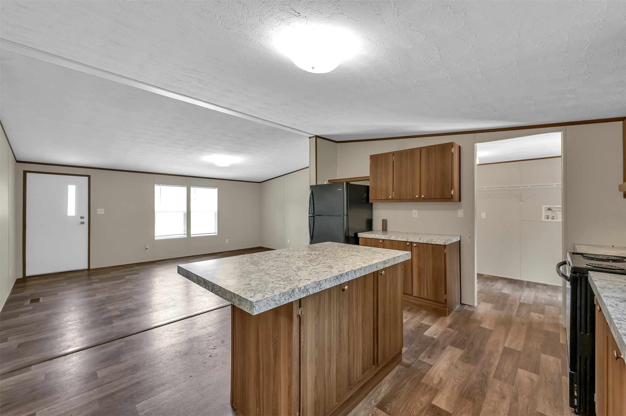 26768 A Dobbin-Huffsmith Road Magnolia, TX 77354 - Photo 14 of 29 a kitchen with a sink stove and refrigerator