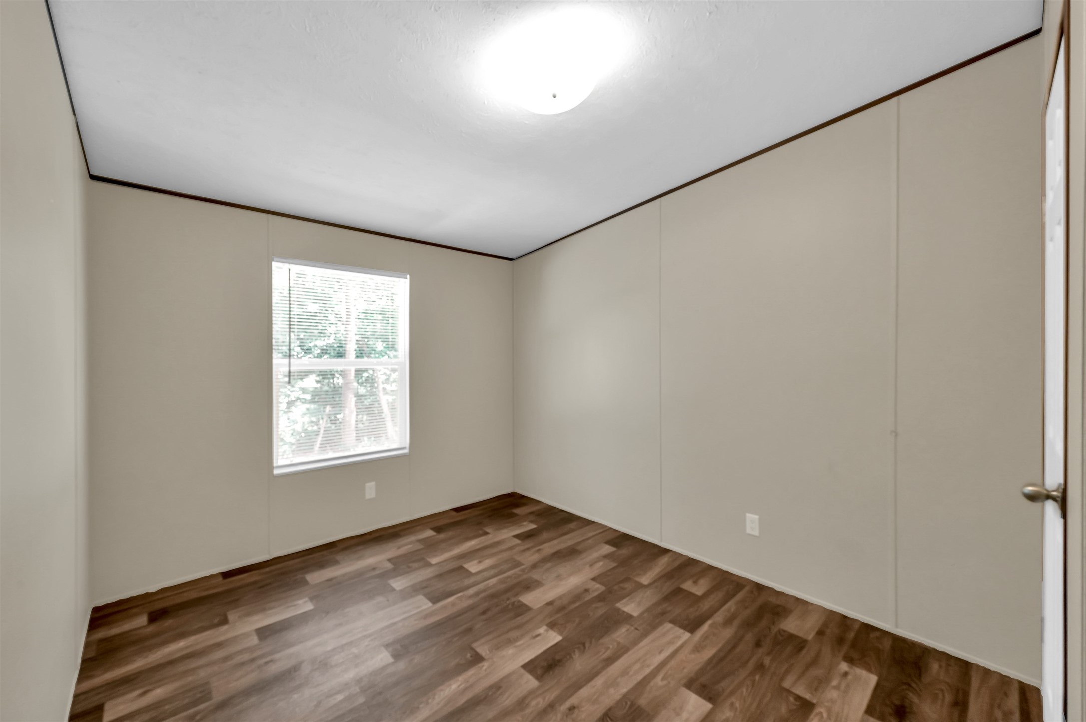 26768 A Dobbin-Huffsmith Road Magnolia, TX 77354 - Photo 24 of 29 wooden floor in an empty room with a window
