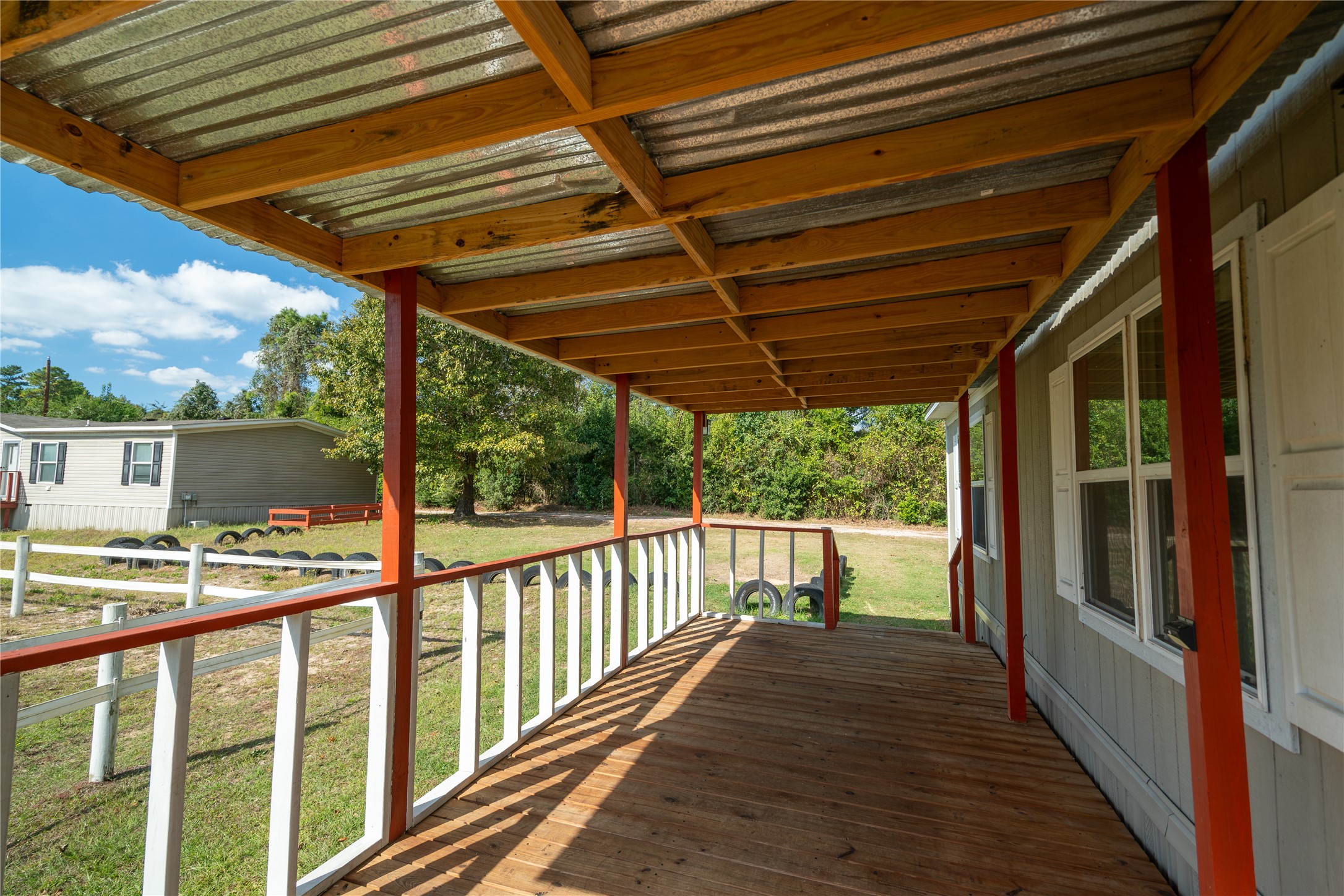 26768 A Dobbin-Huffsmith Road Magnolia, TX 77354 - Photo 27 of 29 a view of a balcony with wooden floor