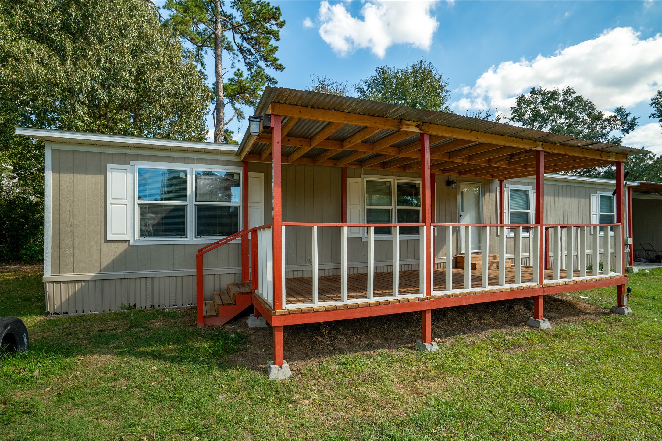 26768 A Dobbin-Huffsmith Road Magnolia, TX 77354 - Photo 28 of 29 a view of a house with a yard