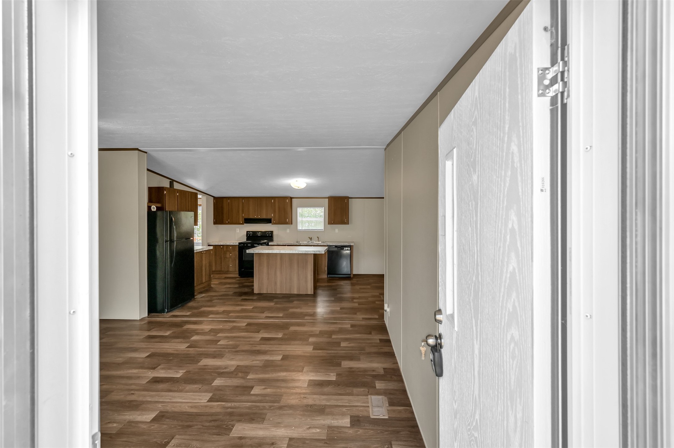 26768 A Dobbin-Huffsmith Road Magnolia, TX 77354 - Photo 8 of 29 a view of a kitchen from the hallway