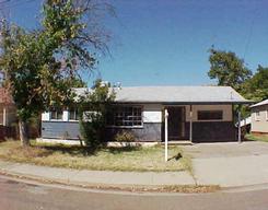 1115 Layton Road, Unit ONE Redding, CA 96002 - Photo 1 of 1 front view of a house with a tree
