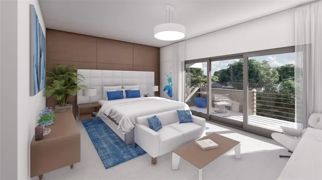 a bedroom with a large bed and a potted plant