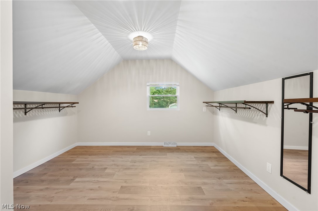 1617 Graham Road Stow, OH 44224 - Photo 43 of 49 Bonus room with light hardwood / wood-style flooring and vaulted ceiling