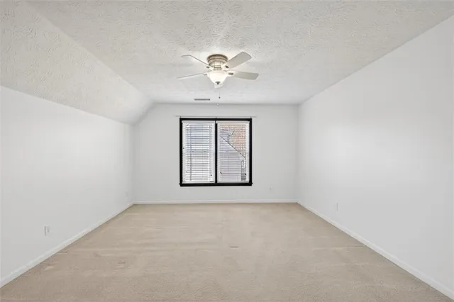 a view of a hallway with staircase