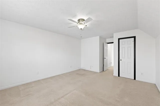 a view of a balcony with wooden floor and outdoor space