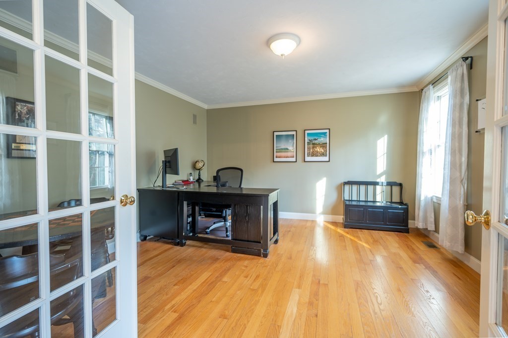 91 Hartness Road Sutton, MA 01590 - Photo 15 of 27 a bedroom with furniture and a wooden floor