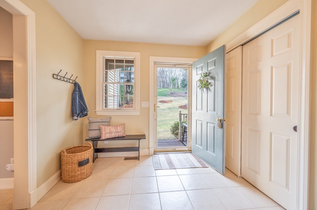 91 Hartness Road Sutton, MA 01590 - Photo 16 of 27 a bathroom with a toilet tub and shower