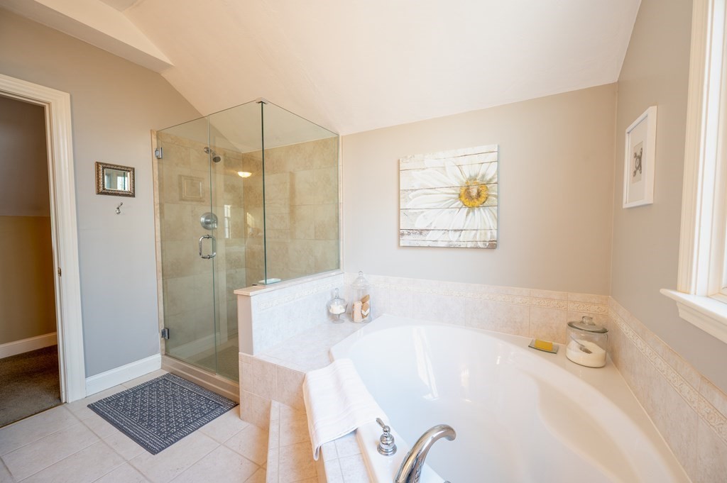 91 Hartness Road Sutton, MA 01590 - Photo 21 of 27 a bathroom with a bathtub and a shower