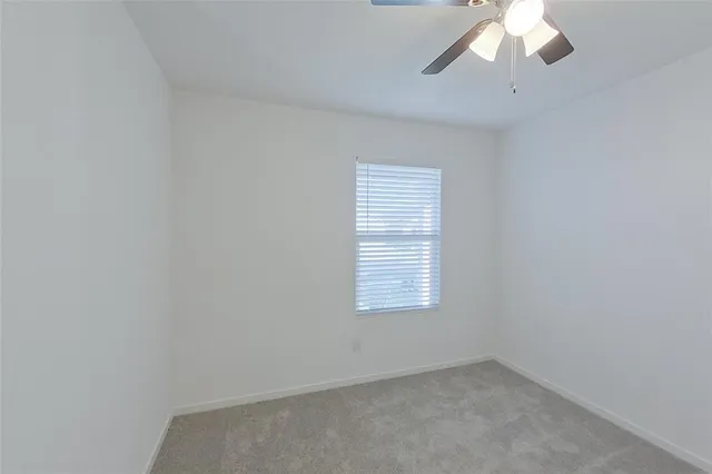 a view of kitchen and windows