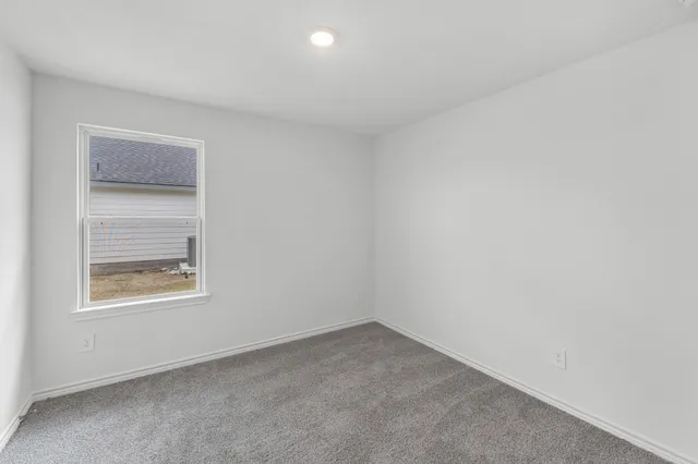 an empty room with a window