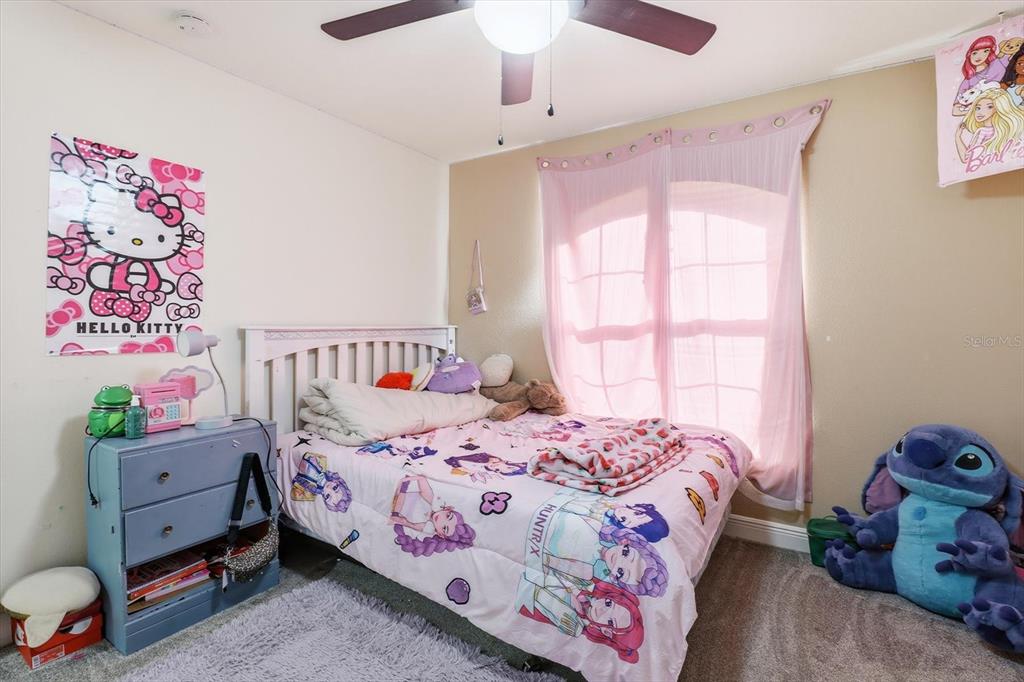 786 North Dugan Avenue Inverness, FL 34453 - Photo 26 of 44 a bedroom with a bed and a window