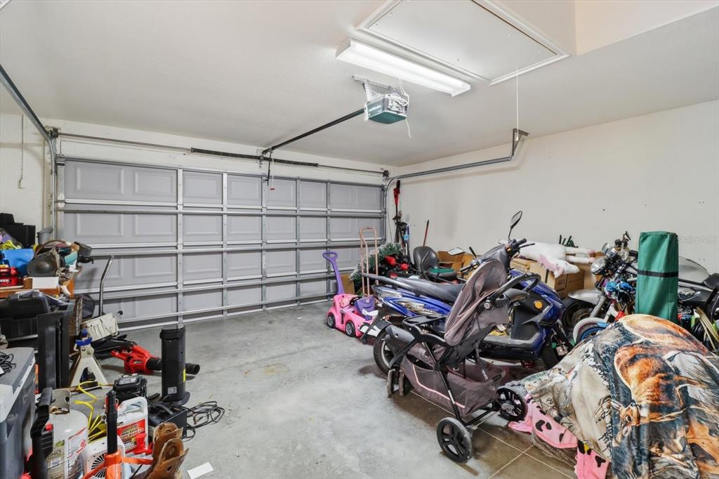 786 North Dugan Avenue Inverness, FL 34453 - Photo 35 of 44 a view of a storage room with a lot of stuff