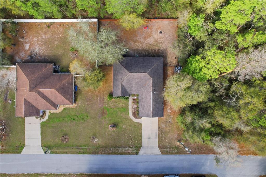 786 North Dugan Avenue Inverness, FL 34453 - Photo 41 of 44 an aerial view of a house with a yard
