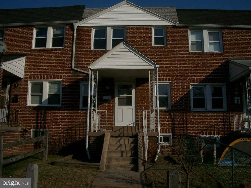 15 Warren Road Baltimore, MD 21221 - Photo 1 of 10 a front view of a house with a yard