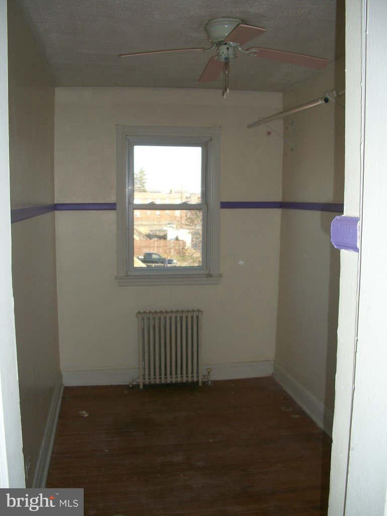 15 Warren Road Baltimore, MD 21221 - Photo 6 of 10 a view of an empty room with a window