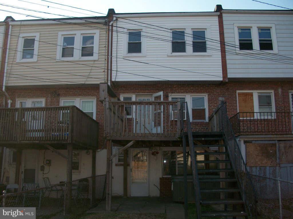 15 Warren Road Baltimore, MD 21221 - Photo 10 of 10 a front view of a house with a chair