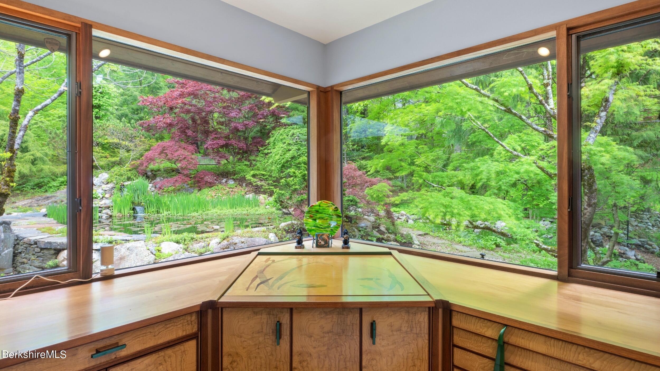 140 Main Road Monterey, MA 01230 - Photo 12 of 44 VIEW TO KOI POND FROM MEDIA ROOM