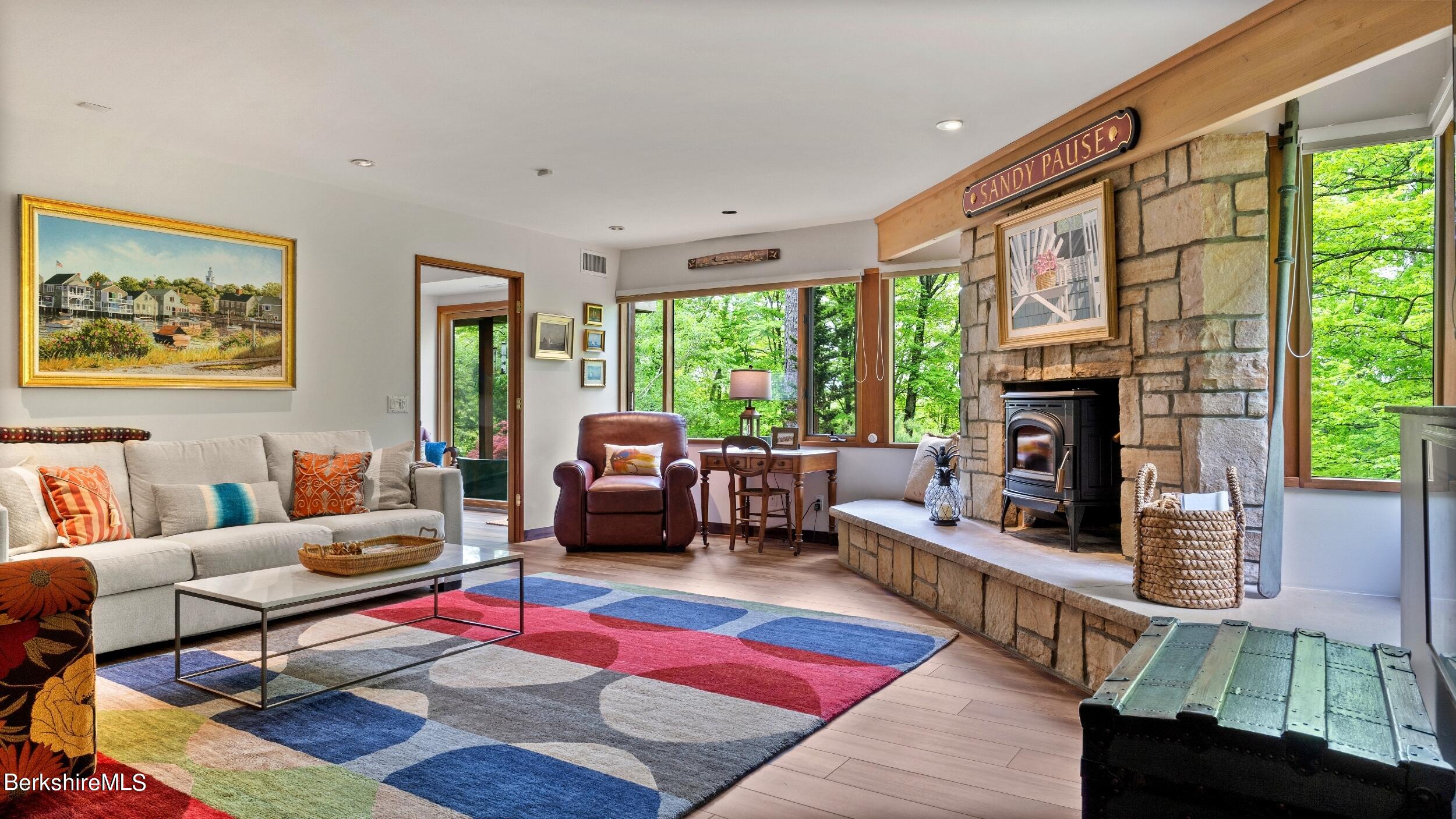 140 Main Road Monterey, MA 01230 - Photo 33 of 44 MEDIA ROOM WITH WOOD BURNING STOVE