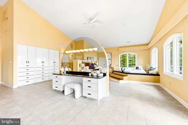 a kitchen with stainless steel appliances a refrigerator and a stove top oven