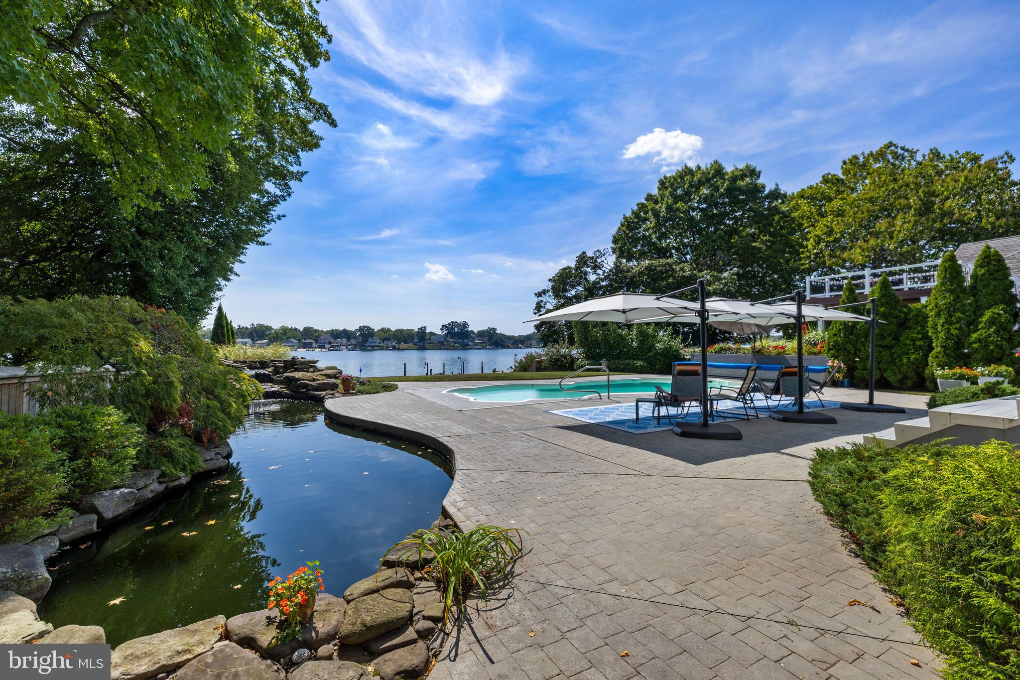 1501 Shore Road Middle River, MD 21220 - Photo 4 of 82 Curved pond with waterfall