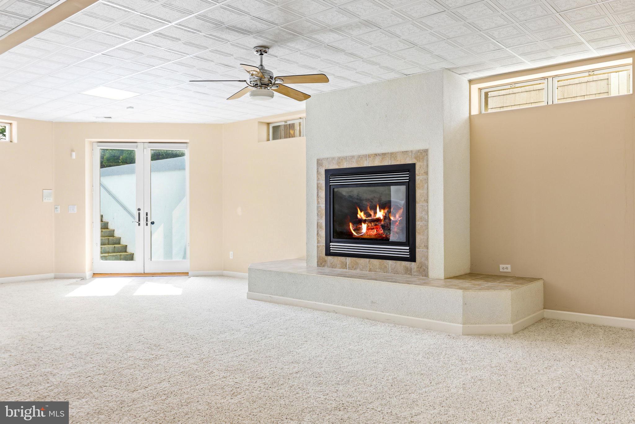 1501 Shore Road Middle River, MD 21220 - Photo 63 of 82 Gas fireplace and walkout to pool & patio
