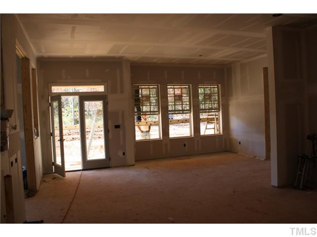 9211 Concord Hill Court Raleigh, NC 27613 - Photo 8 of 18 Enormous breakfast room off kitchen has large windows and french doors to huge covered porch. Breakfast Area