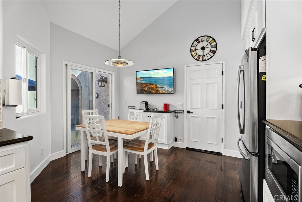 3 Nice Laguna Niguel, CA 92677 - Photo 13 of 66 a view of a dining room with furniture wooden floor and a rug
