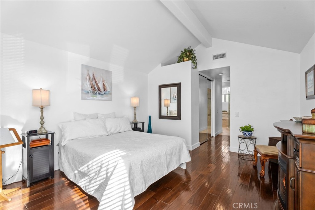 3 Nice Laguna Niguel, CA 92677 - Photo 15 of 66 a bedroom with a bed and wooden floor