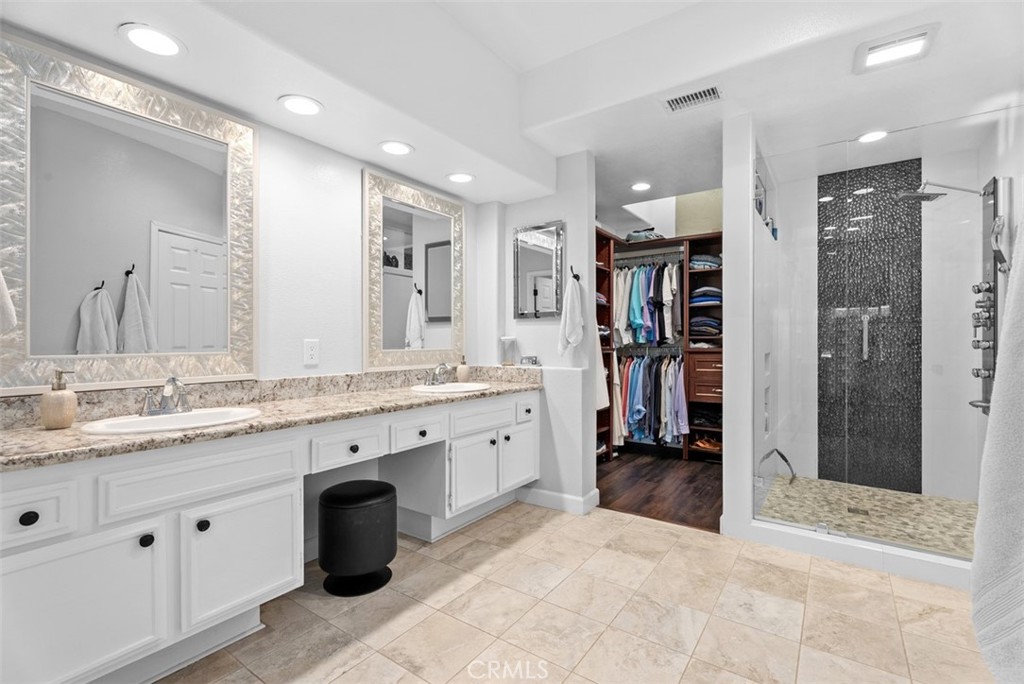 3 Nice Laguna Niguel, CA 92677 - Photo 29 of 66 a large bathroom with a granite countertop sink mirror and shower