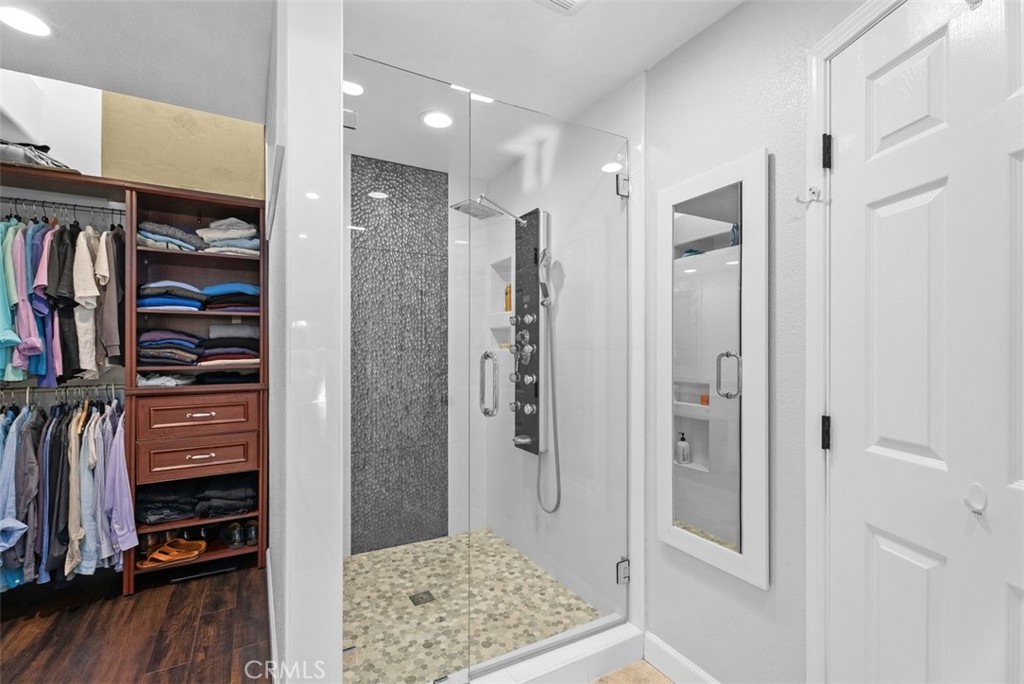 3 Nice Laguna Niguel, CA 92677 - Photo 30 of 66 a view of walk in closet with clothes and shoes