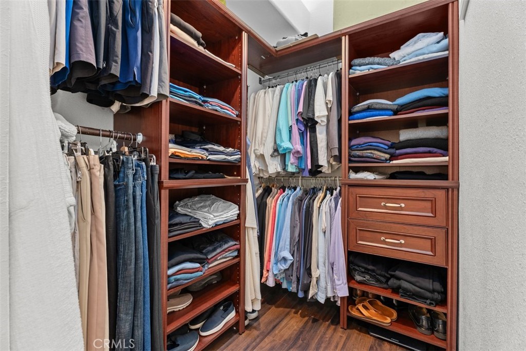 3 Nice Laguna Niguel, CA 92677 - Photo 31 of 66 a view of walk in closet with clothes and shoes
