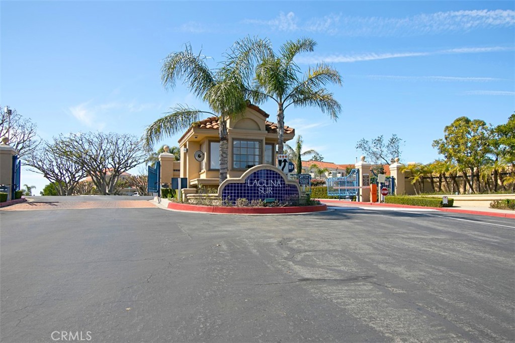 3 Nice Laguna Niguel, CA 92677 - Photo 33 of 66 a front view of a house with a yard and garage