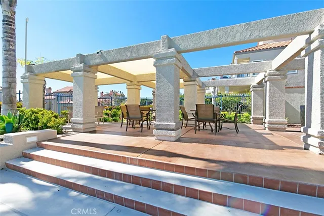 a view of a swimming pool and a chairs