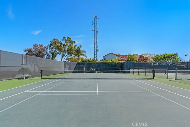 a view of a street with a building in the background