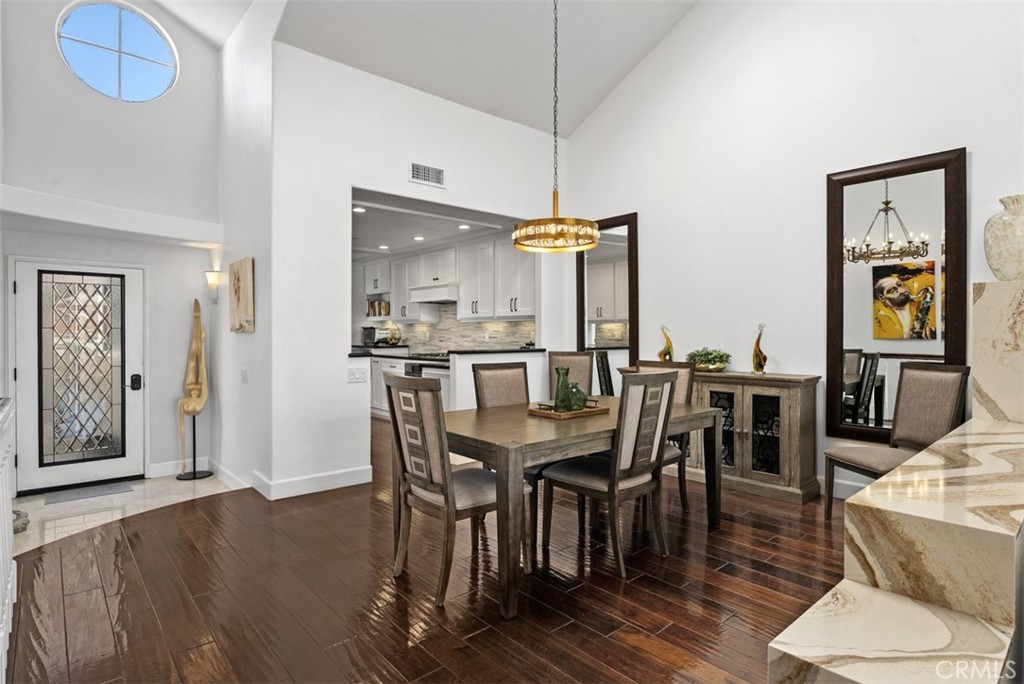 3 Nice Laguna Niguel, CA 92677 - Photo 6 of 66 a view of a dining room with furniture and wooden floor