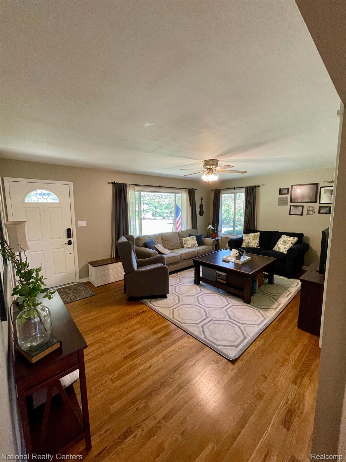 6723 Langle Drive Clarkston, MI 48346 - Photo 11 of 42 Front door enters to beautiful living room